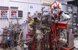 Ion Beam Laboratory. Apparatus for spectroscopic studies of ion beam collisions with energies up to 1 keV
