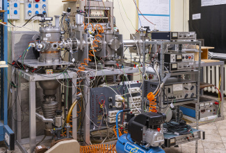 Ion Beam Laboratory. Llinear ion gas accelerator for studying collisions at intermediate energies 